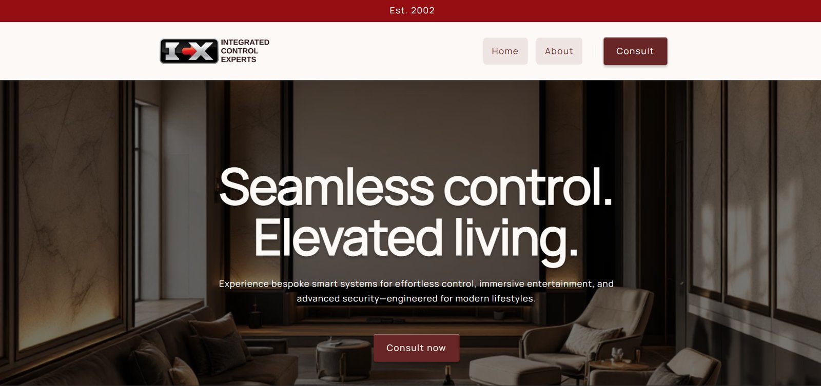 The Integrated Control Experts home page, with the headline 'Seamless control. Elevated living.' set over a cinematic photograph of a luxurious living room interior.